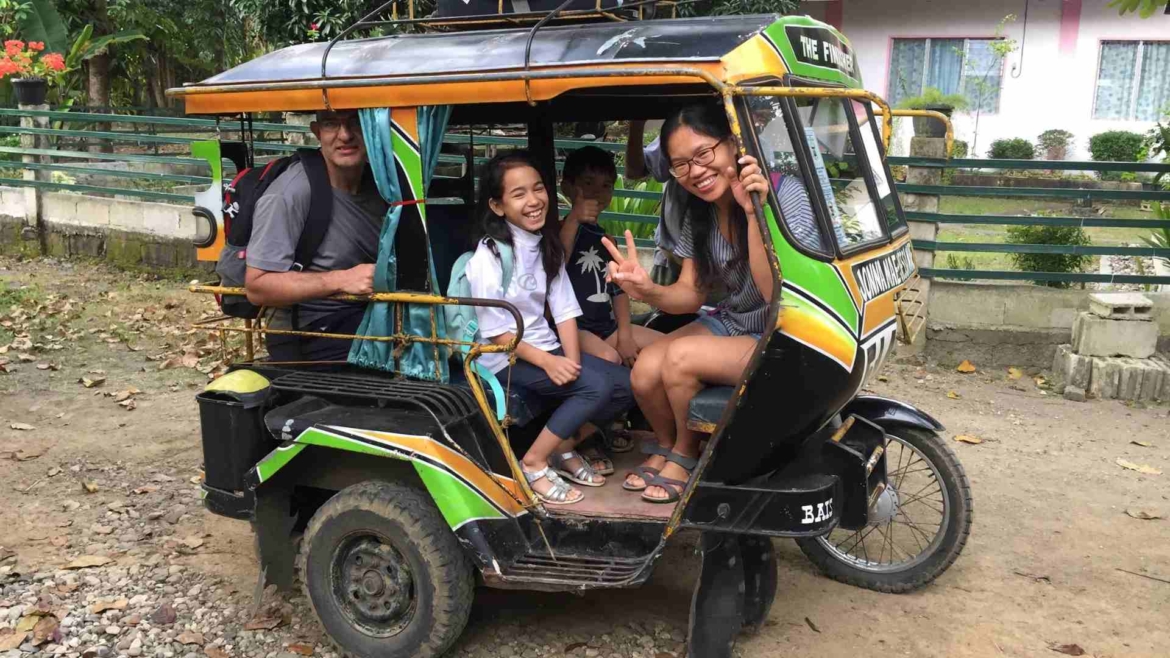 On a tricycle to Manjuyod Sandbar, Bais
