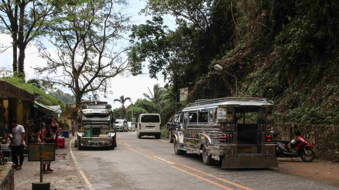 Jeepneys on a narrow road