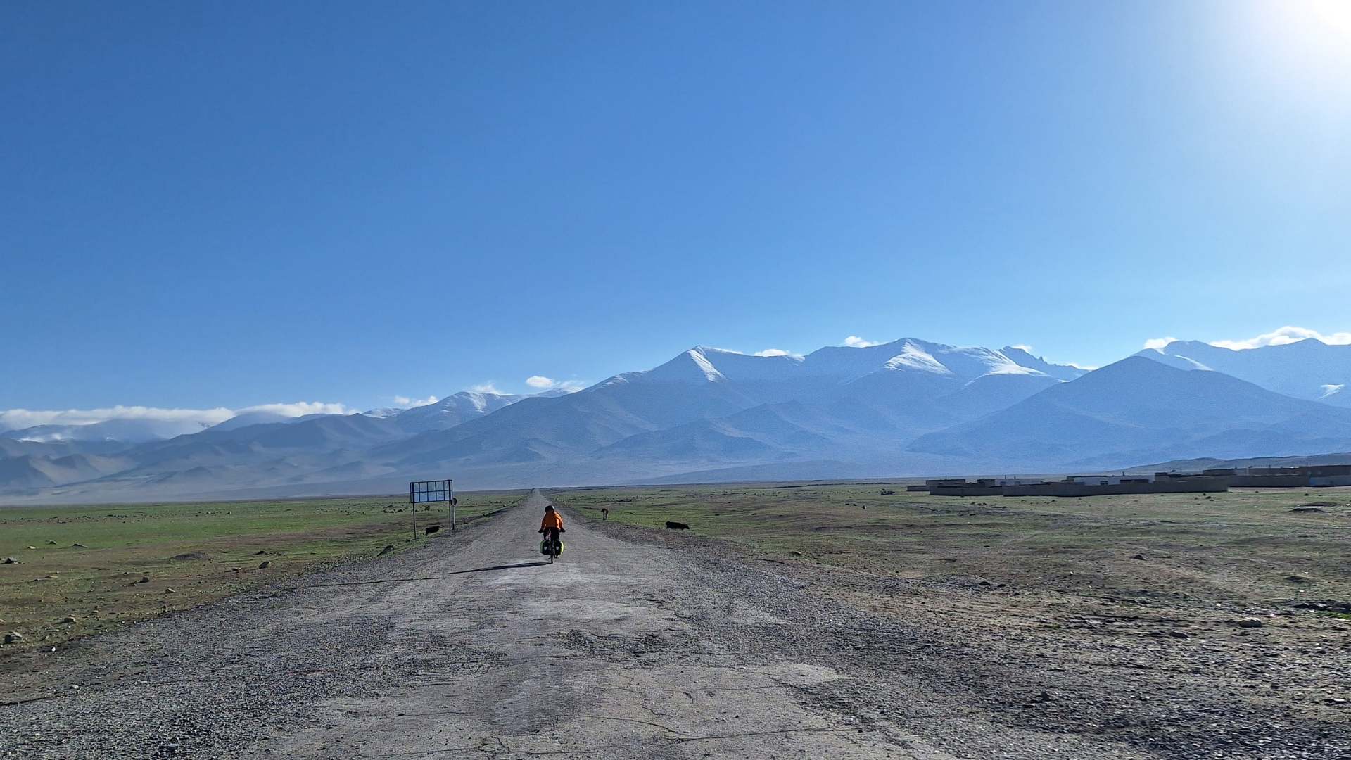 A lonely cycling traveler on the Pamir Highway
