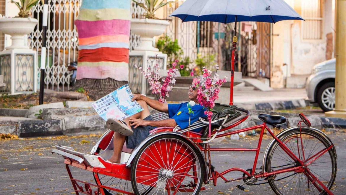 A trishaw with its driver in Georgetown