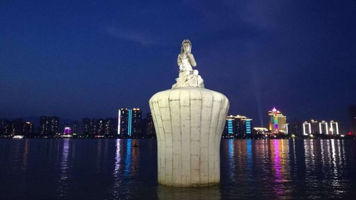 Jiangbin Park at evening, view of Beijiang River and its Mother's statue