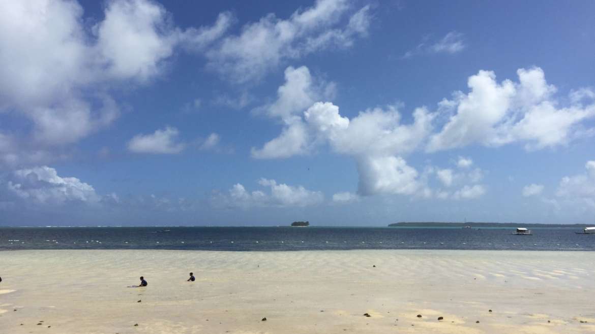 What to do in Siargao- enjoy the stunning crystal ocean and the pure blue sky